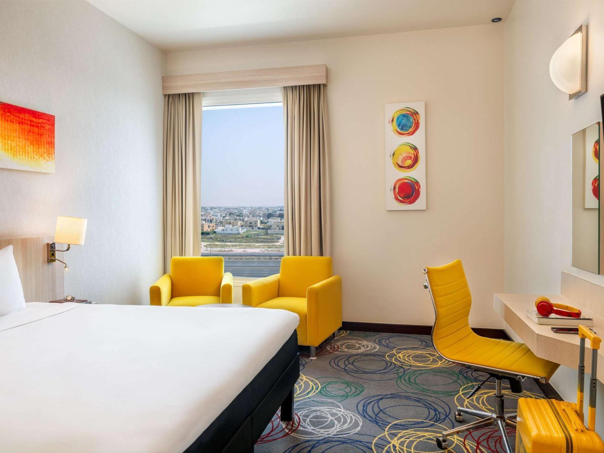 Hotel Ibis Styles Dragon Mart Dubaï Extérieur photo