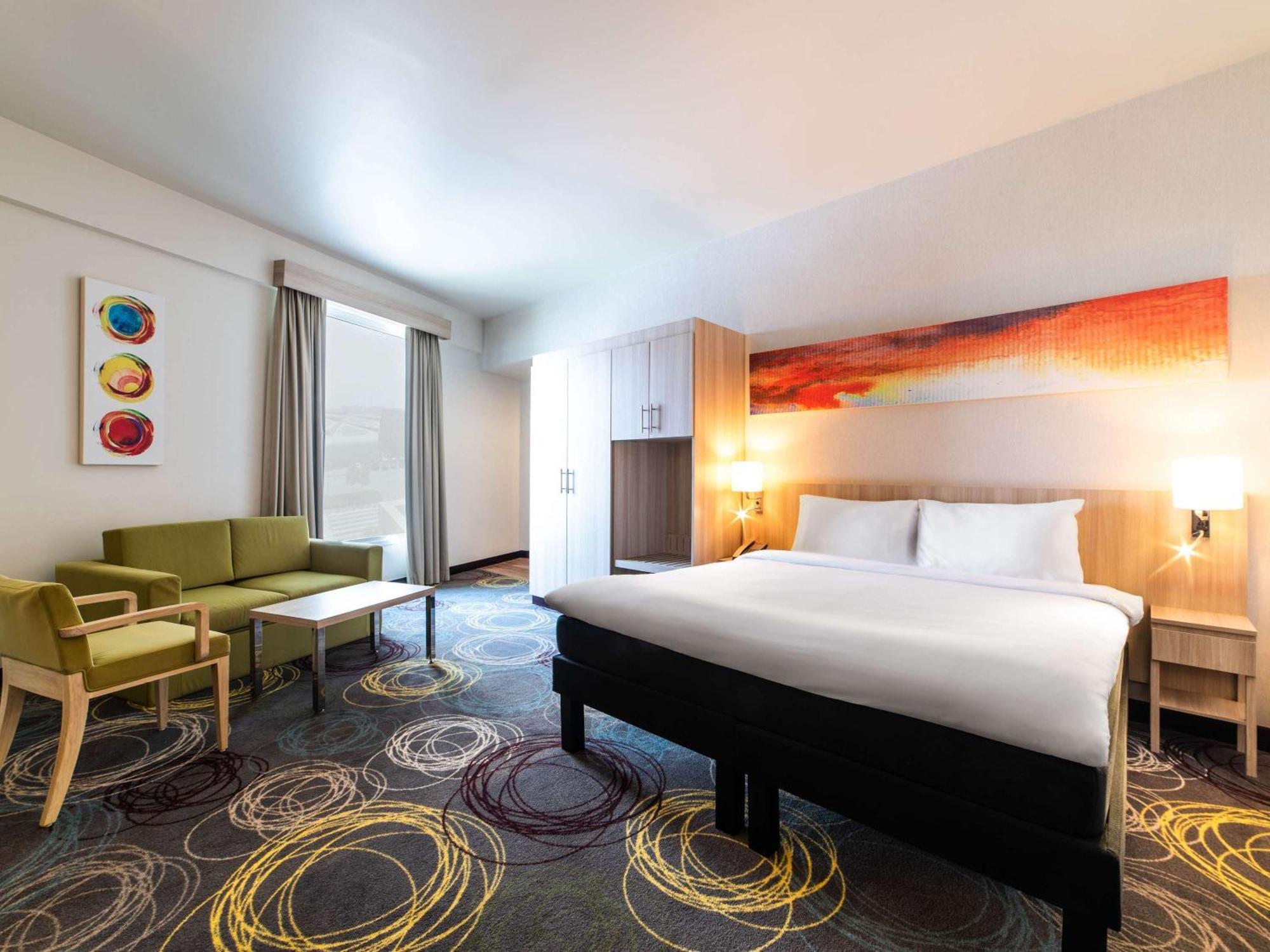 Hotel Ibis Styles Dragon Mart Dubaï Extérieur photo